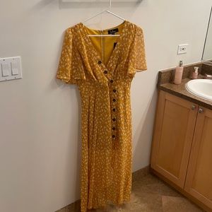 Lulu’s never been worn floral yellow high/low dress